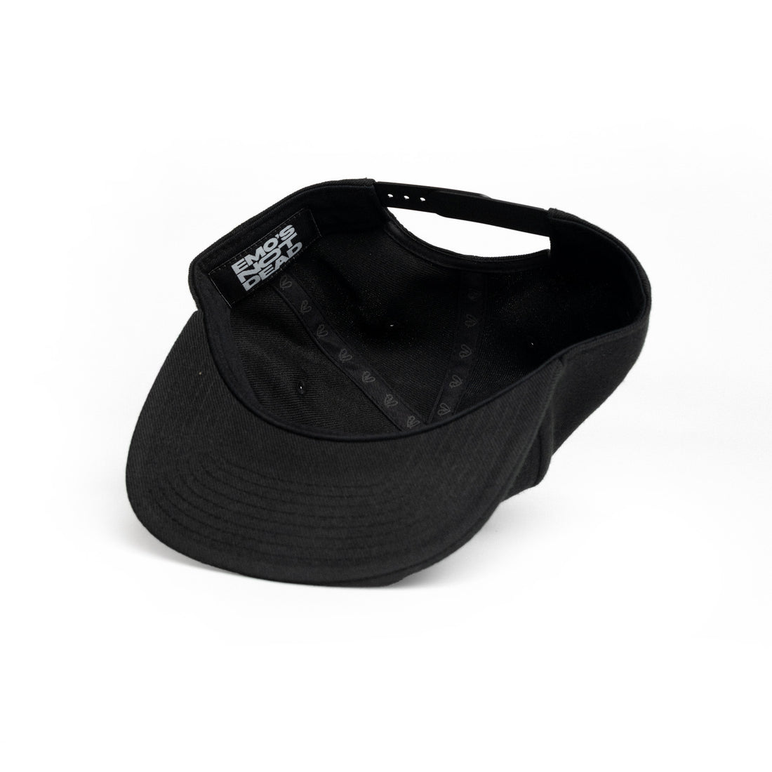 A black visor cap with a small white &