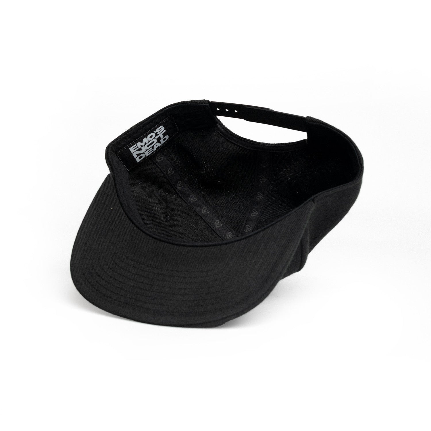 A black visor cap with a small white &