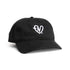 A black baseball cap with a white embroidered logo of a heart containing the letters &
